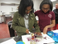 Chopping red onions for our coleslaw